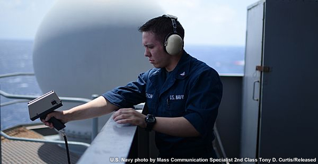 photo of aerographter taking a sea water temperature observation