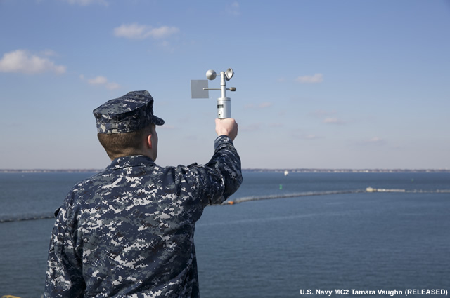 photo of aerographer's mate at work aboard the USS Kearsarge