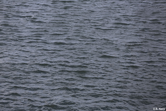 photo of waves on surface of water