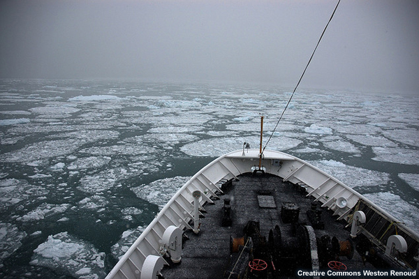 Photo of ship in ice floes and fog
